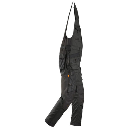 Salopette extensible poches fourre-tout